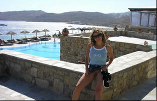 Cougar on holiday in the sun demonstrating her melons and